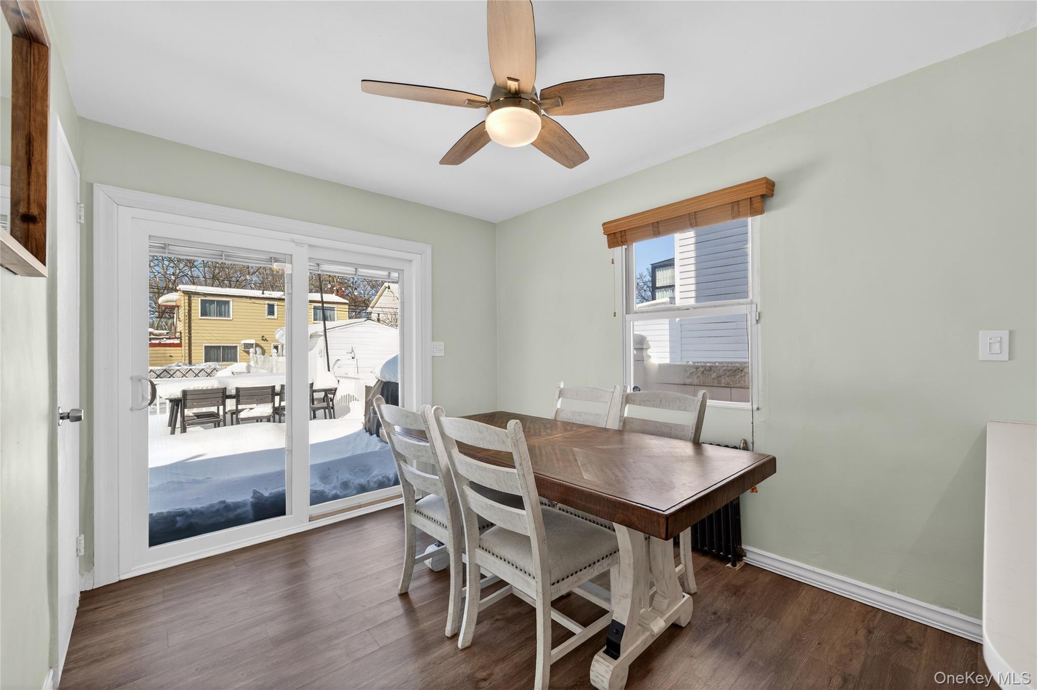 49-54 166th Street Queens, NY 11365 - Photo 21 of 41 a view of a dining room with furniture window and wooden floor