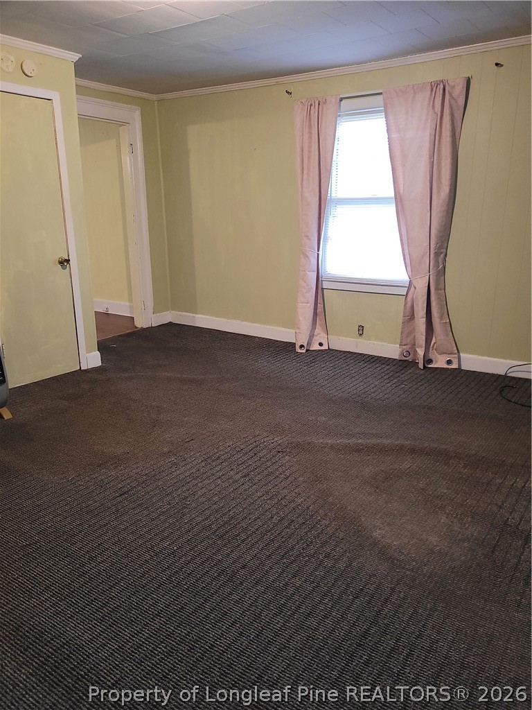 39 Durant Road Wilson's Mills, NC 27527 - Photo 8 of 11 a view of an empty room with a window