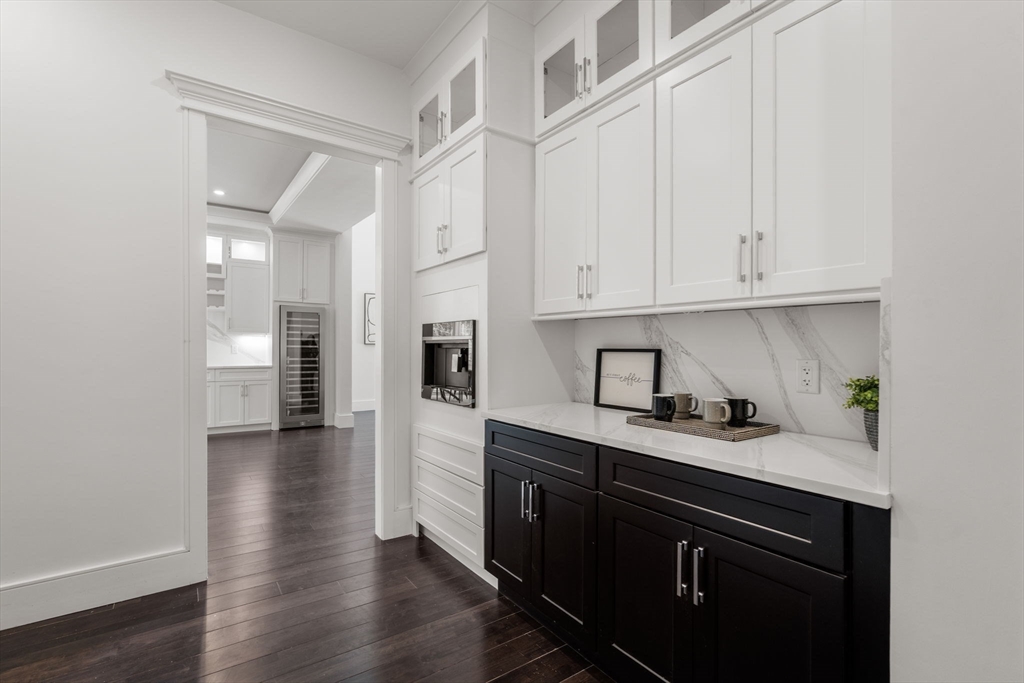 51 Plympton Road Sudbury, MA 01776 - Photo 12 of 38 a kitchen with stainless steel appliances granite countertop a sink stove and cabinets