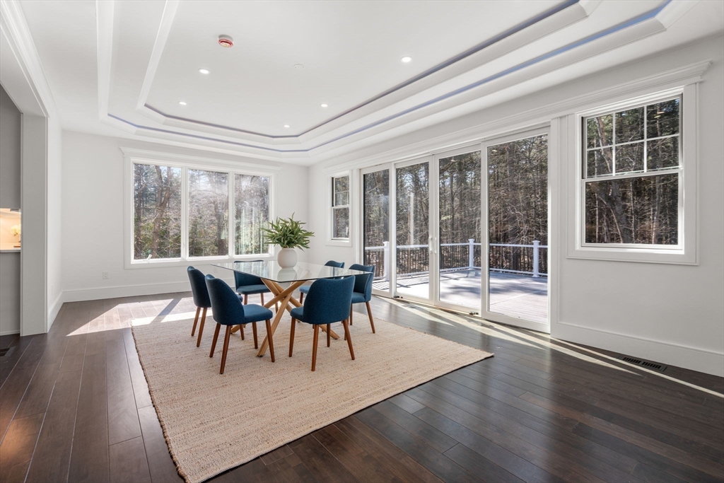 51 Plympton Road Sudbury, MA 01776 - Photo 14 of 38 a view of a dining room with furniture window and wooden floor