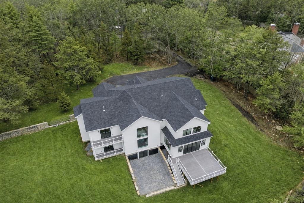 51 Plympton Road Sudbury, MA 01776 - Photo 37 of 38 an aerial view of a house with a big yard
