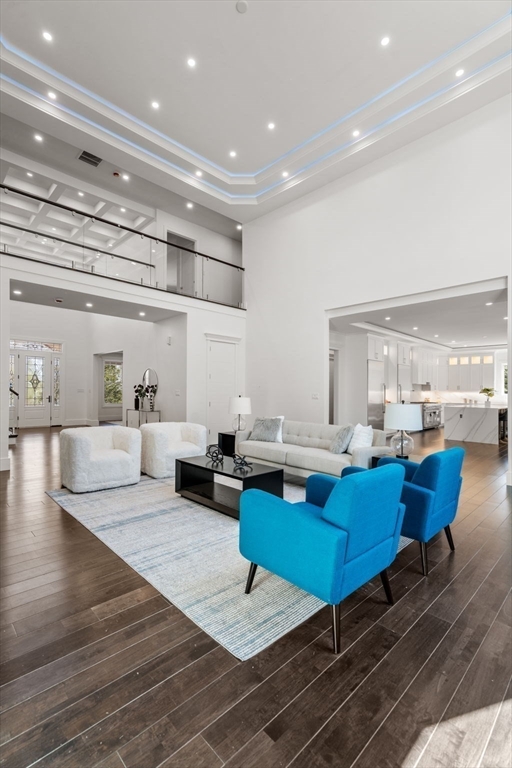 51 Plympton Road Sudbury, MA 01776 - Photo 6 of 38 a living room with furniture a rug and a table