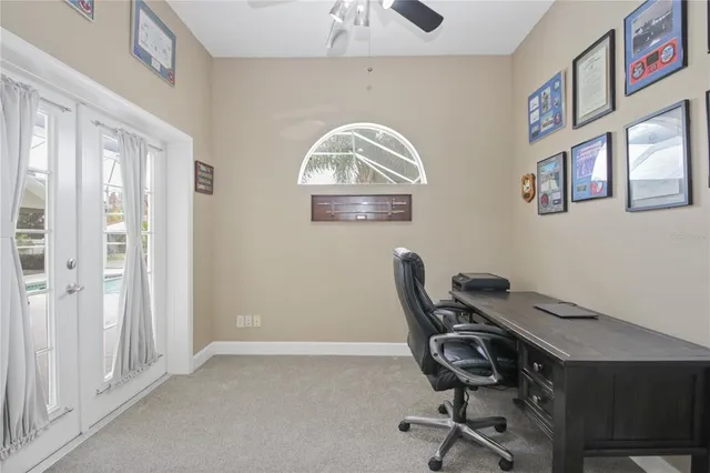 a view of a workspace with furniture