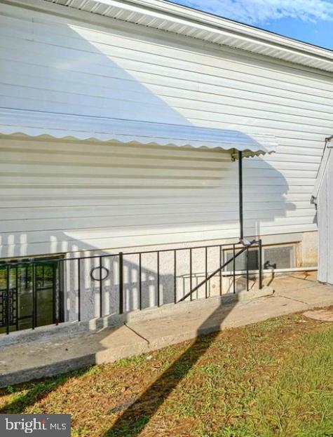 4504 Scotts Level Court Baltimore, MD 21208 - Photo 6 of 6 side door entrance driveway parking