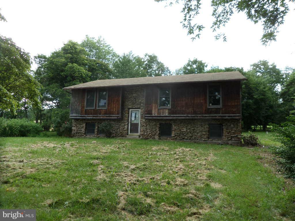 4242 Roop Road Mount Airy, MD 21771 - Photo 1 of 14 a view of a house with backyard and a tree