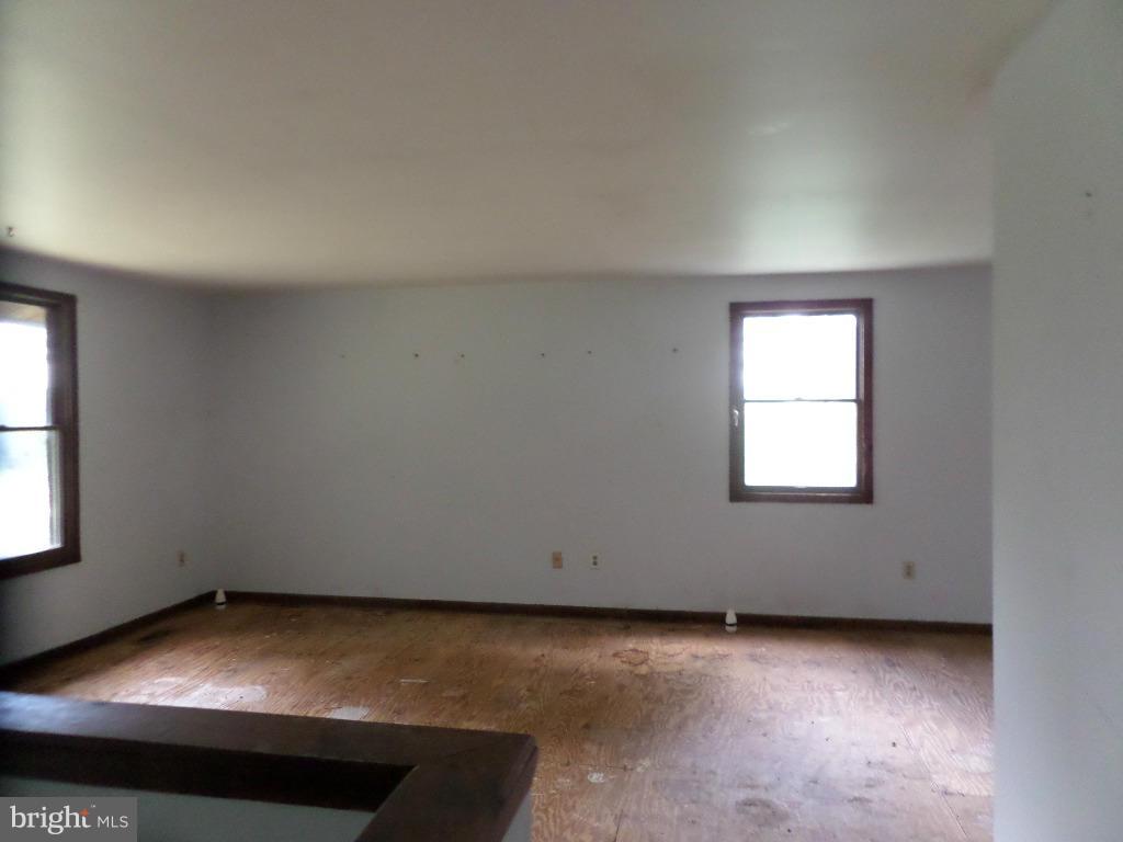 4242 Roop Road Mount Airy, MD 21771 - Photo 2 of 14 an empty room with a window