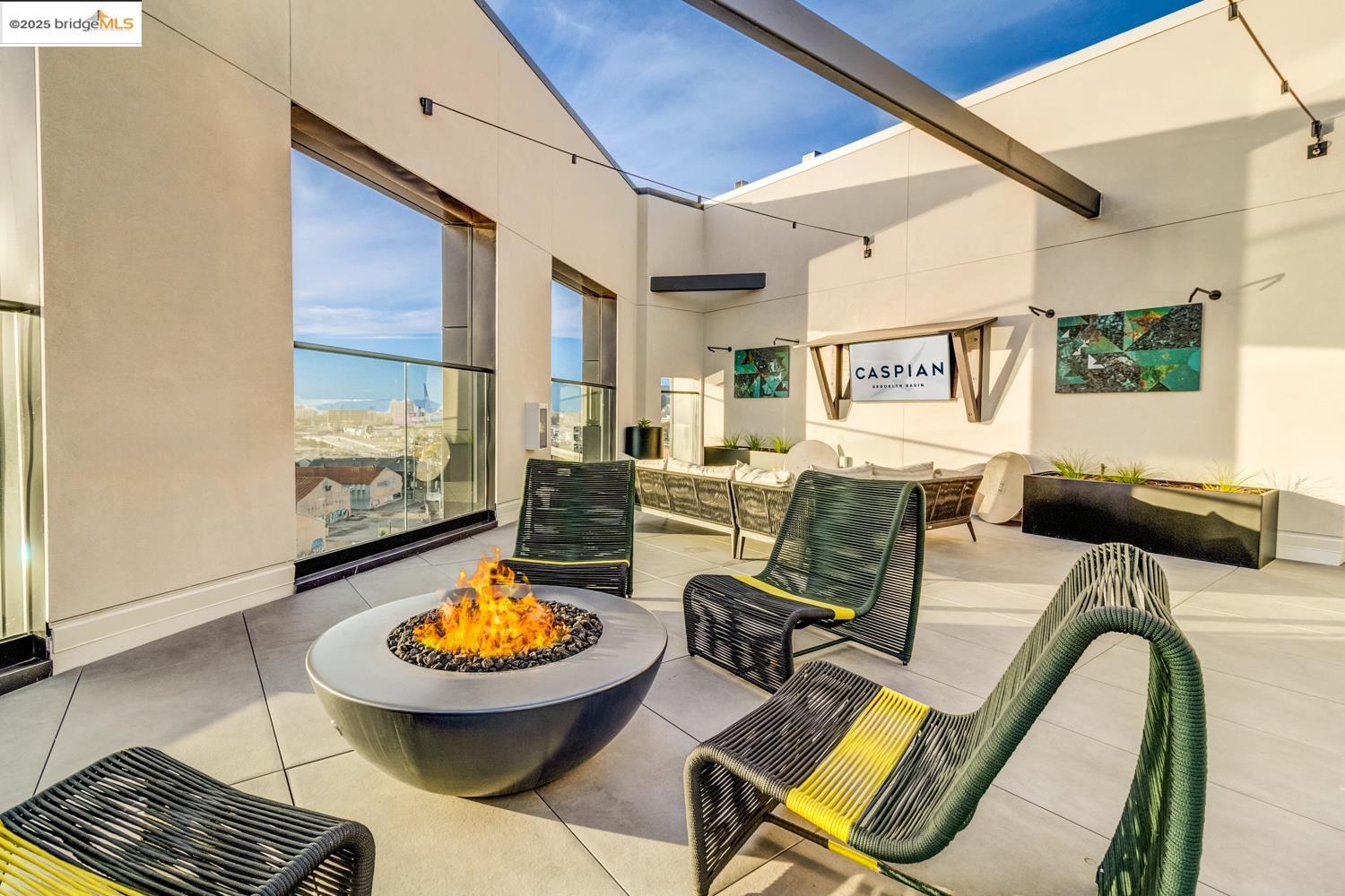 260 Brooklyn Basin Way, Unit 417 Oakland, CA 94606 - Photo 24 of 48 View of patio / terrace with an outdoor fire pit