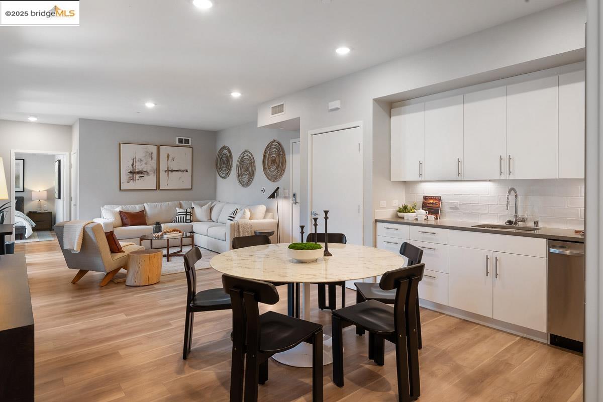 260 Brooklyn Basin Way, Unit 417 Oakland, CA 94606 - Photo 7 of 48 Dining room with light wood finished floors and recessed lighting