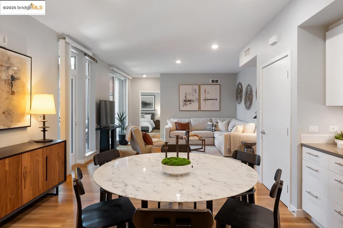 260 Brooklyn Basin Way, Unit 417 Oakland, CA 94606 - Photo 8 of 48 Dining room featuring light wood-style floors and recessed lighting