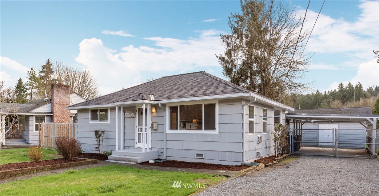 3309 Southeast 5th Street Renton, WA 98058 - Photo 1 of 23 a view of house with yard
