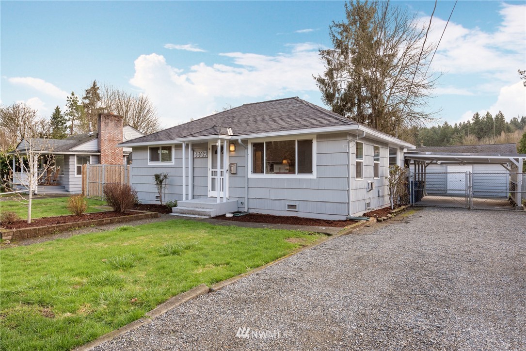 3309 Southeast 5th Street Renton, WA 98058 - Photo 3 of 23 a view of a house with a yard