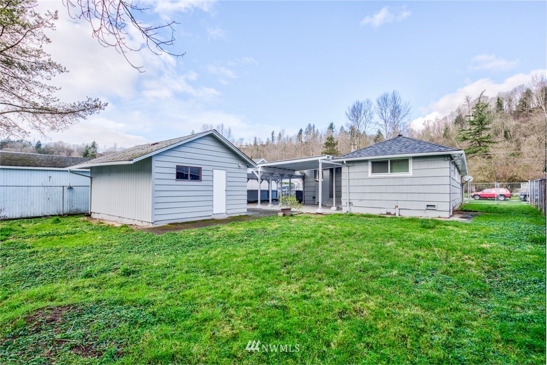 3309 Southeast 5th Street Renton, WA 98058 - Photo 21 of 23 a view of a house with backyard and garden