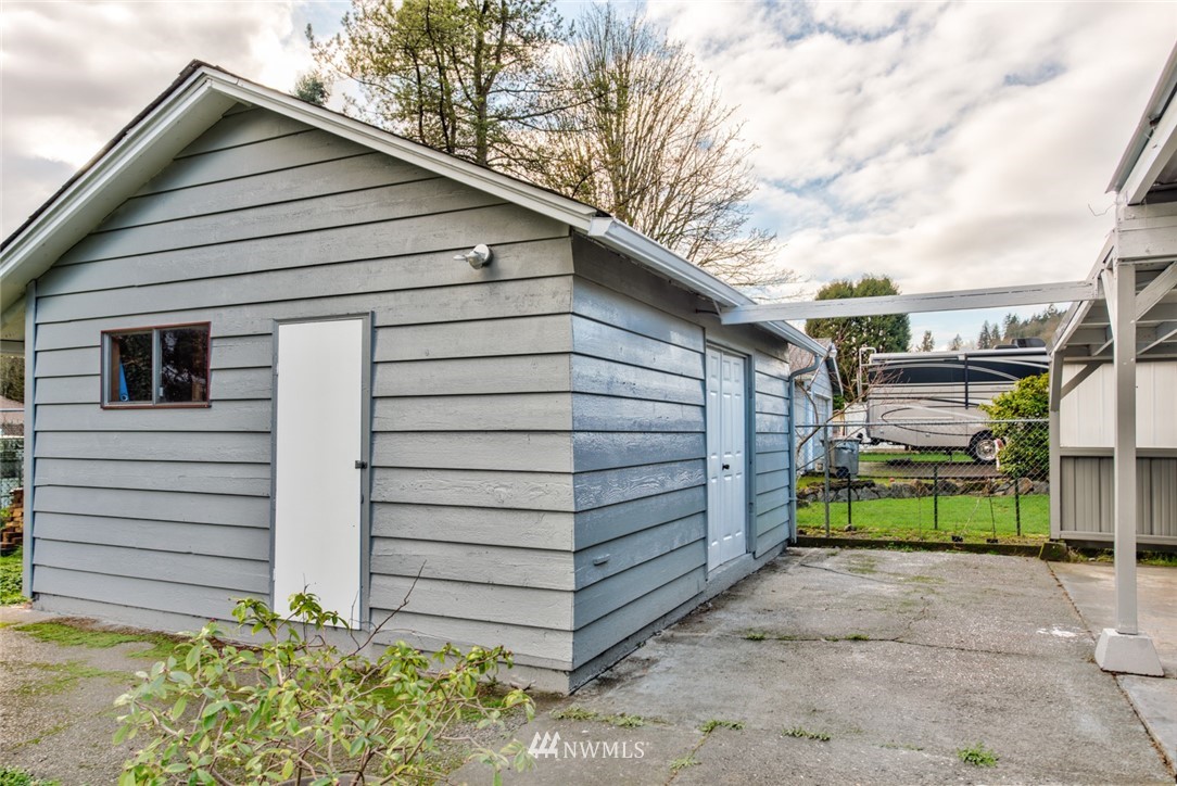 3309 Southeast 5th Street Renton, WA 98058 - Photo 23 of 23 a view of a house with a backyard