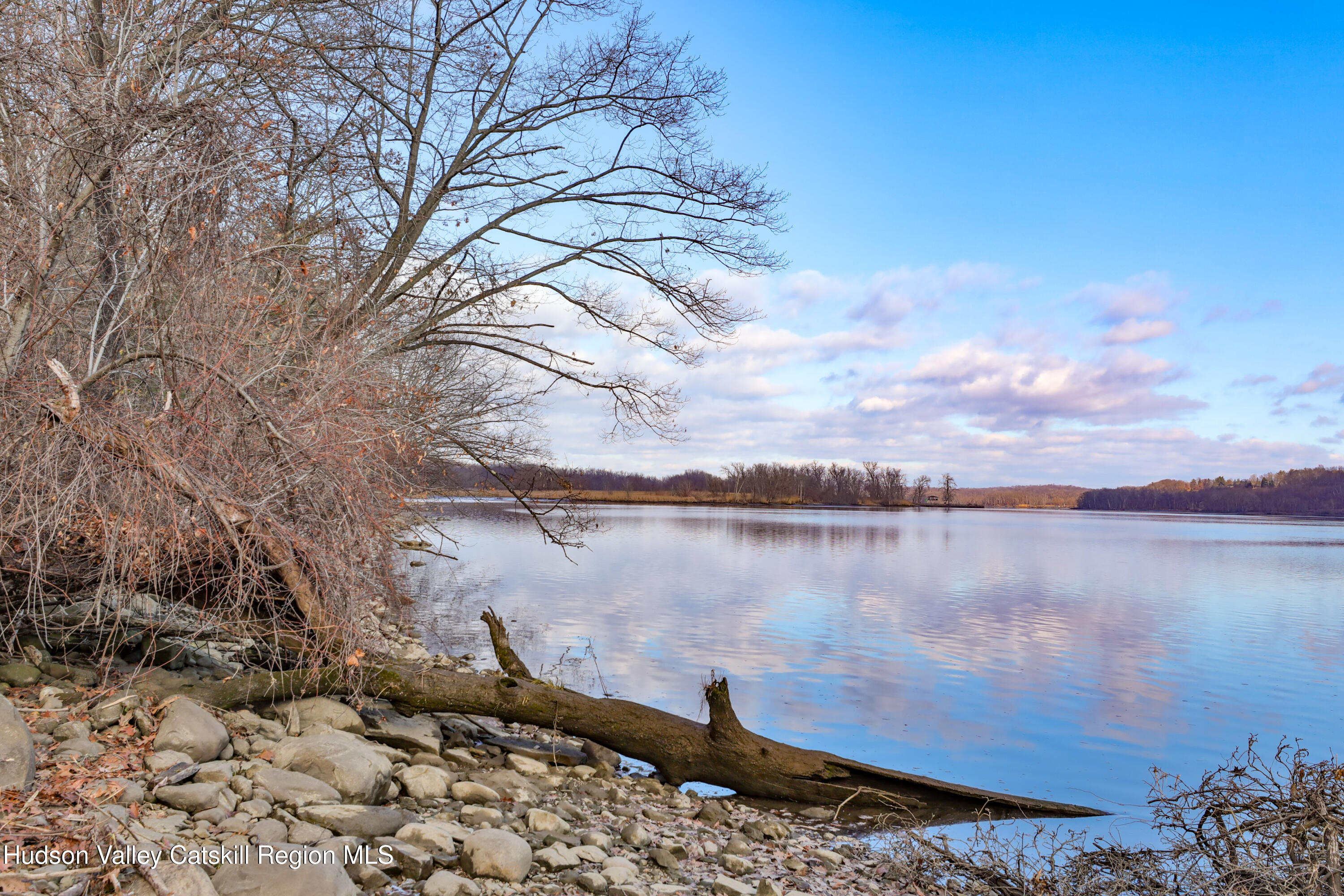 219-237 Swezey Road Coxsackie, NY 12051 - Photo 7 of 9 a view of a lake with a mountain