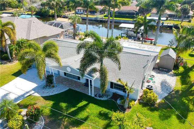 a view of a swimming pool with a patio