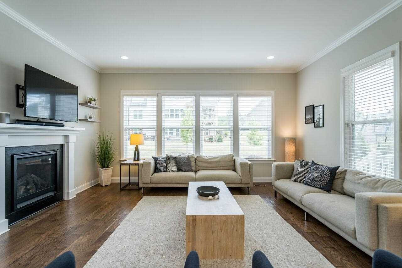 5264 Aleppo Lane Raleigh, NC 27613 - Photo 12 of 30 Sun drenched room makes this open space a favorite in this home. Living Room