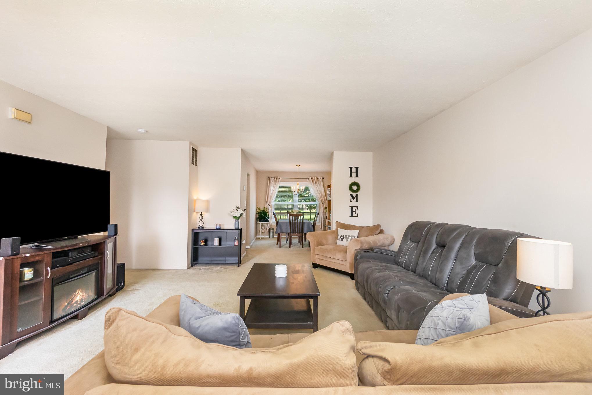 Living Room opens to Dining Area