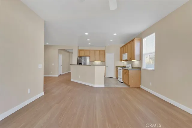 a view of kitchen with wooden floor