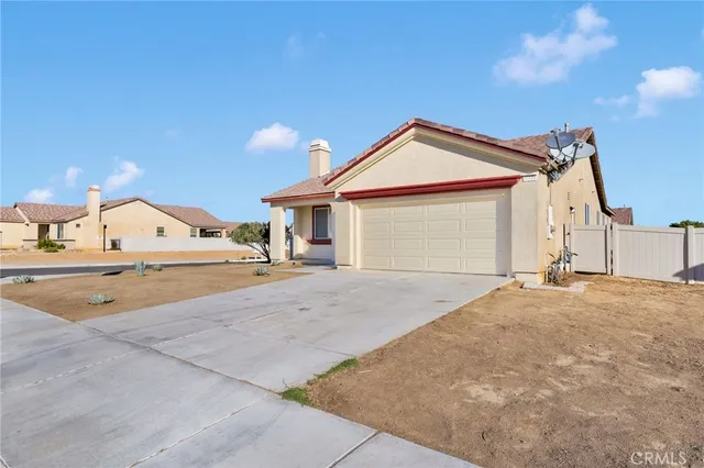 a view of a house with basketball court