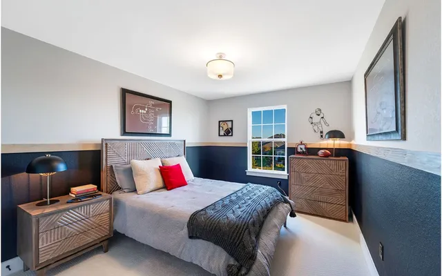 a view of a house with backyard and porch