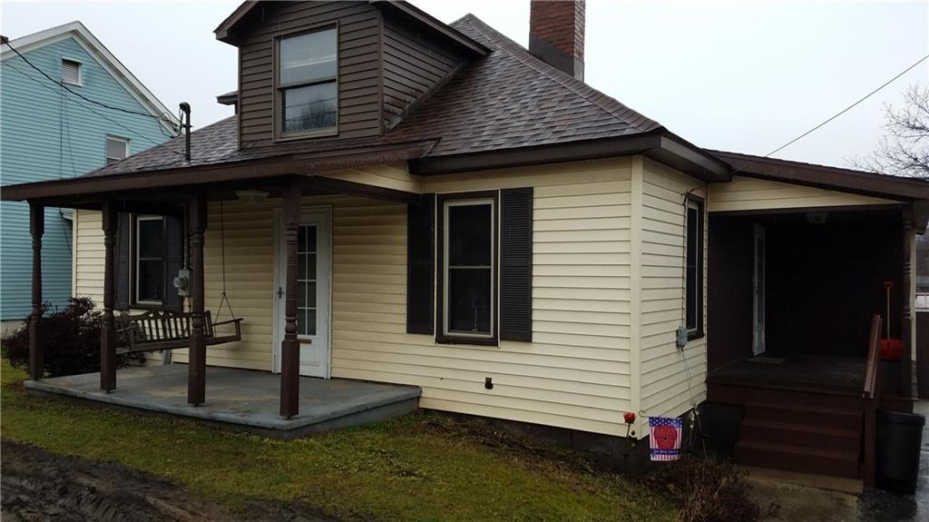 2391 Mt Pleasant Road Ruffs Dale, PA 15679 - Photo 1 of 19 Cute story and half with front porch and full covered side porch