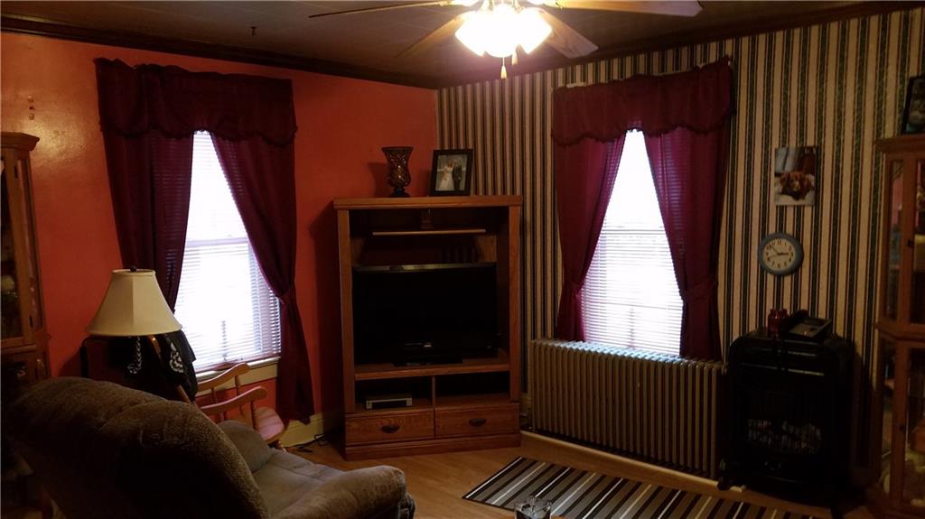 2391 Mt Pleasant Road Ruffs Dale, PA 15679 - Photo 6 of 19 Another view of the living room with ceiling fan