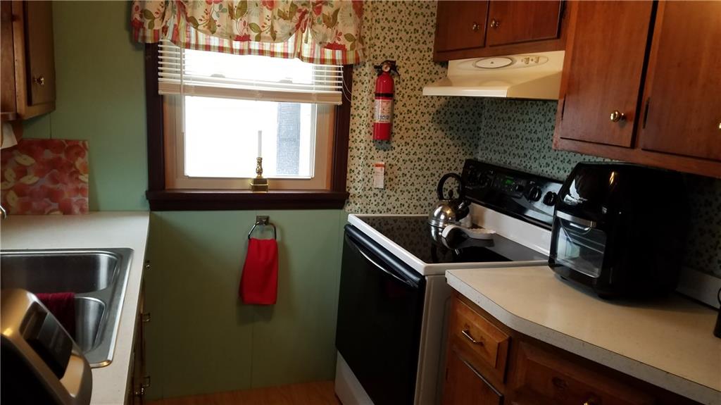 2391 Mt Pleasant Road Ruffs Dale, PA 15679 - Photo 7 of 19 Galley kitchen with double stainless sink