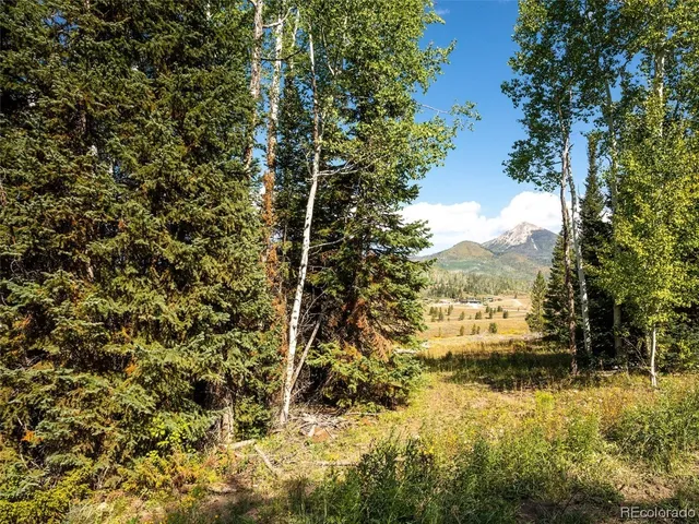 a view of an outdoor space and mountain view