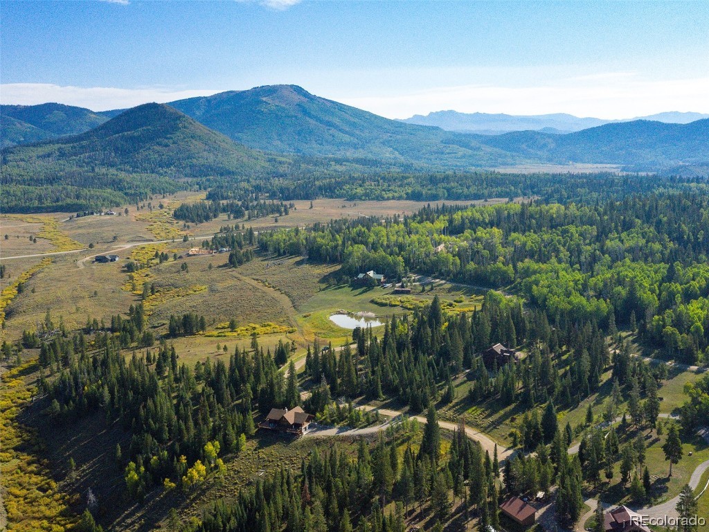 60218 Antelope Way Clark, CO 80428 - Photo 29 of 34 a view of a lake in middle of green field