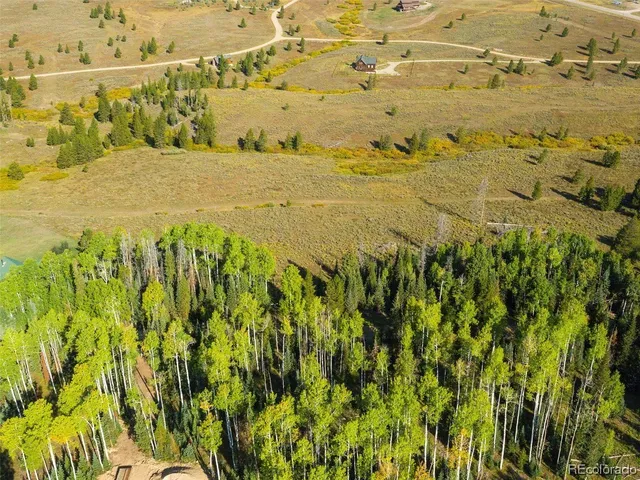a view of a city with an ocean beach