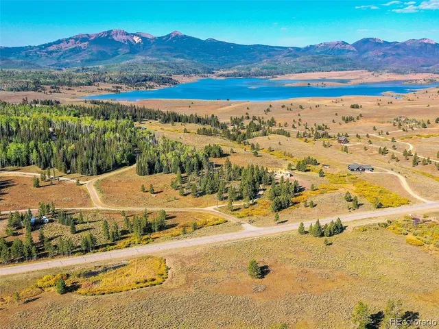 a view of a lake with mountains in the background