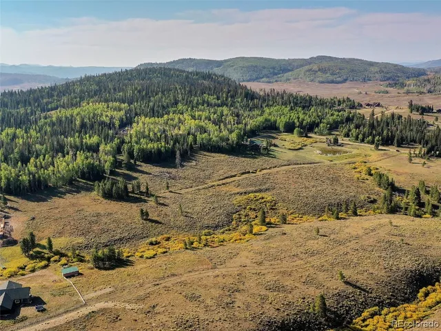 a view of a backyard of a house