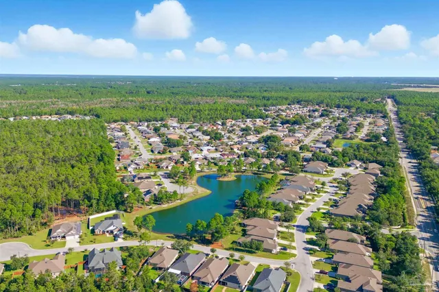 a kitchen with stainless steel appliances a refrigerator and a stove