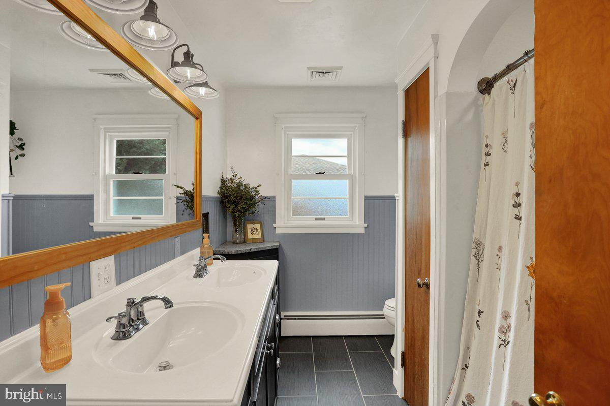 172 Fairview Drive Hanover, PA 17331 - Photo 25 of 50 a bathroom with a sink and a mirror