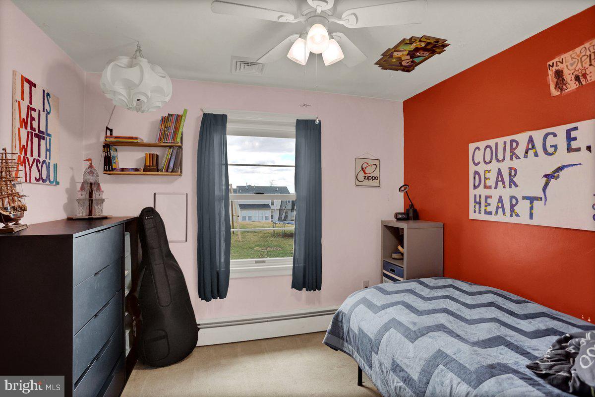 172 Fairview Drive Hanover, PA 17331 - Photo 28 of 50 a bedroom with a bed and a chandelier