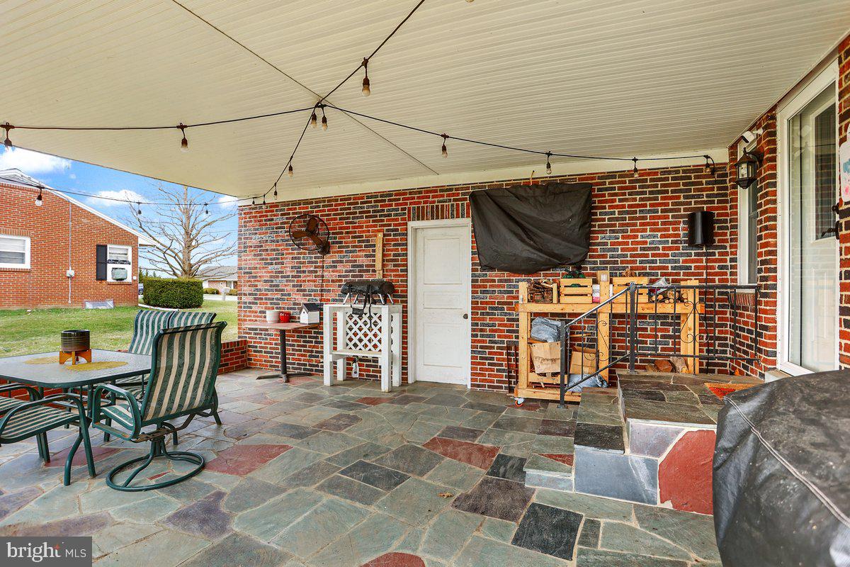 172 Fairview Drive Hanover, PA 17331 - Photo 39 of 50 a view of a patio with a table and chairs