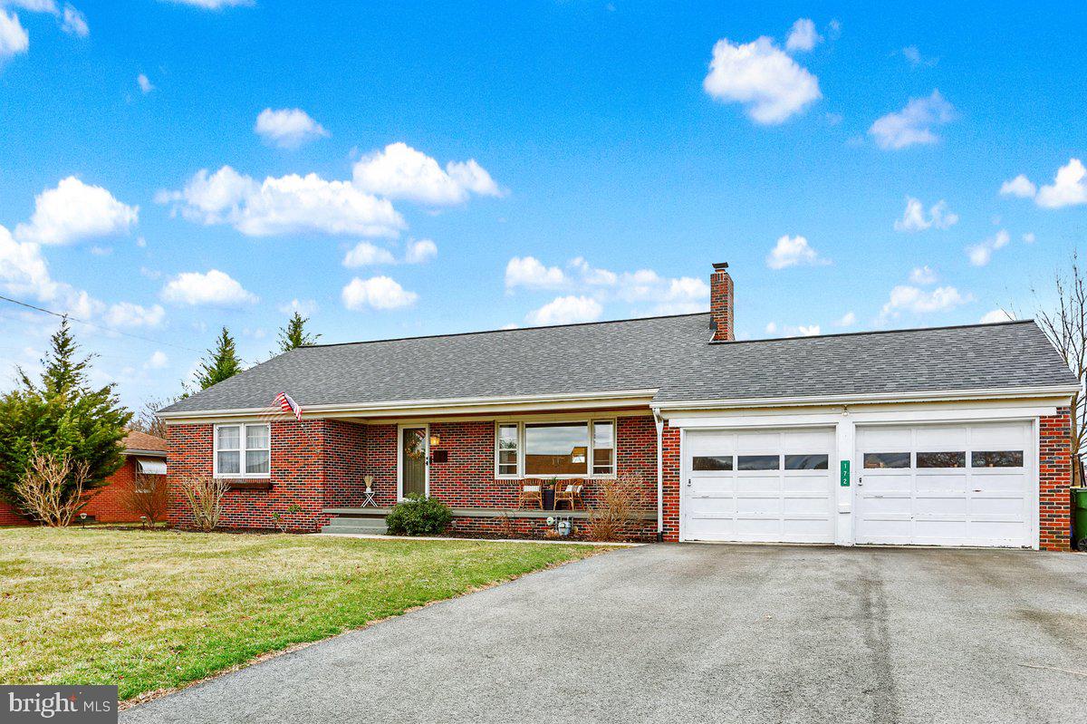 172 Fairview Drive Hanover, PA 17331 - Photo 4 of 50 a front view of a house with a yard and garage