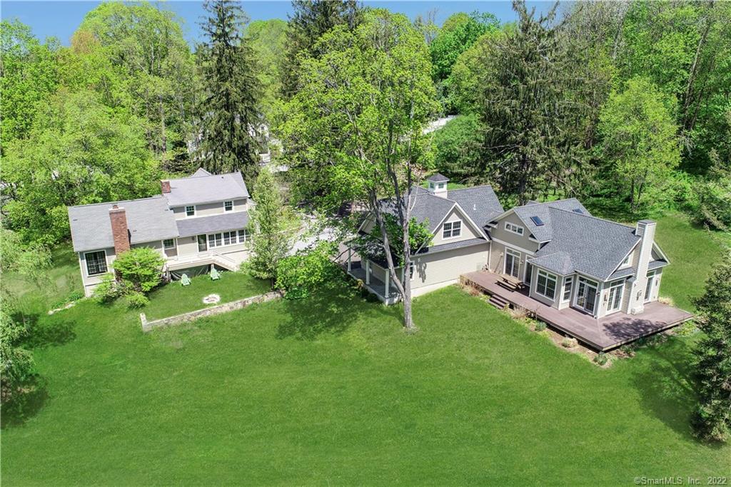 26 Wooster Street Ridgefield, CT 06877 - Photo 1 of 1 an aerial view of residential house with outdoor space and trees all around