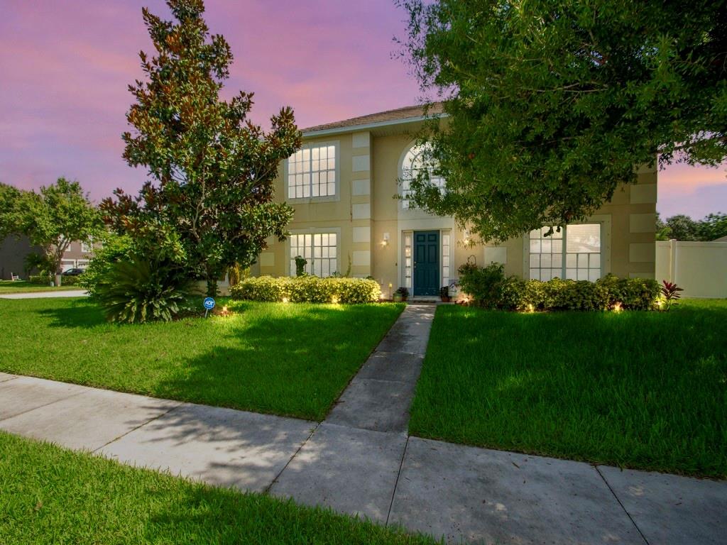 a view of a house with a garden