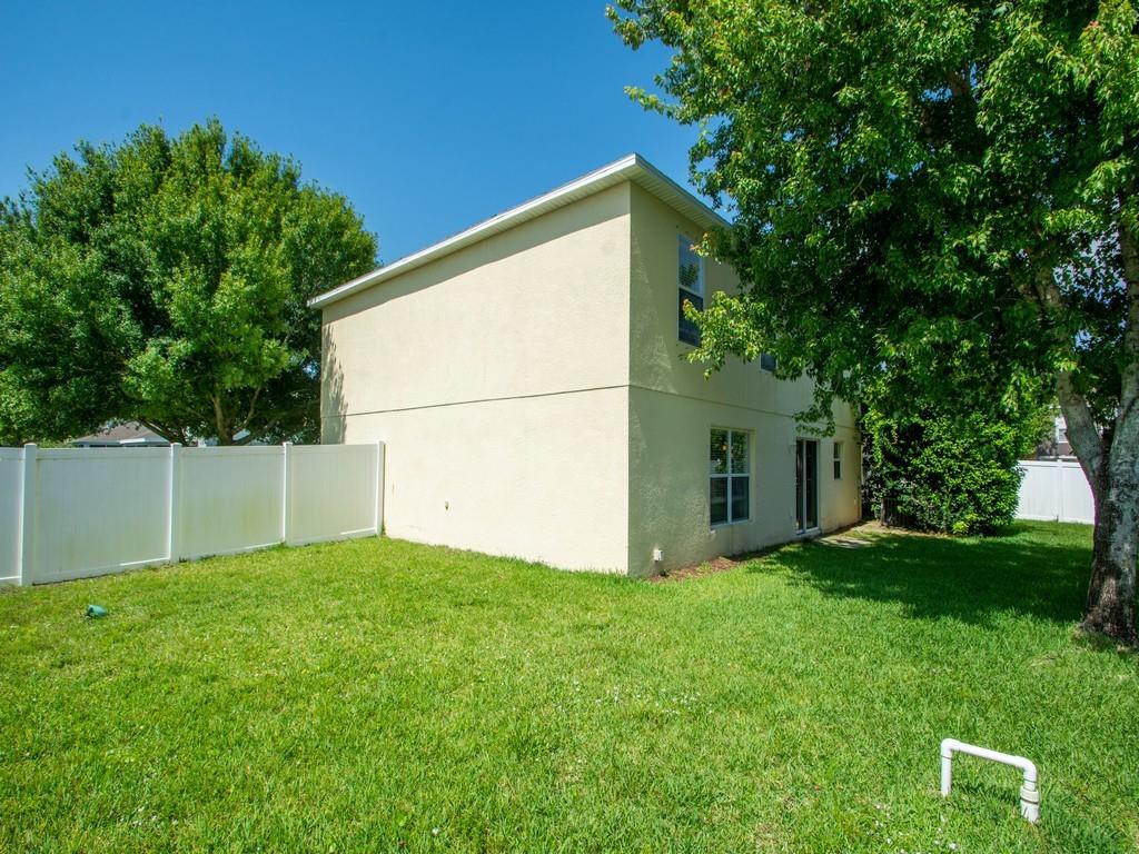 5985 Ridge Lake Circle Vero Beach, FL 32967 - Photo 17 of 27 a view of yard with small cabin