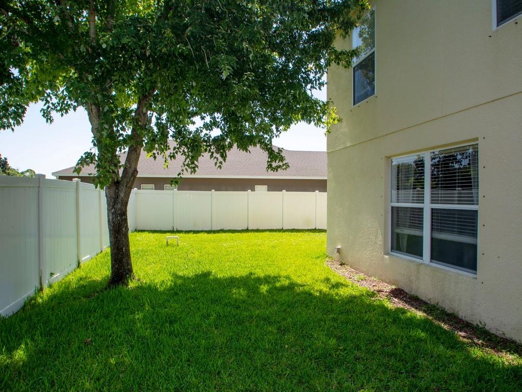 5985 Ridge Lake Circle Vero Beach, FL 32967 - Photo 20 of 27 a view of an outdoor space and yard