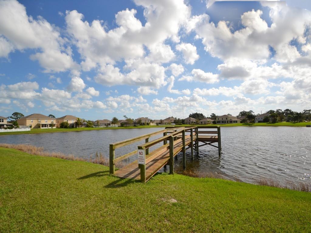 5985 Ridge Lake Circle Vero Beach, FL 32967 - Photo 21 of 27 a view of a lake with outdoor seating