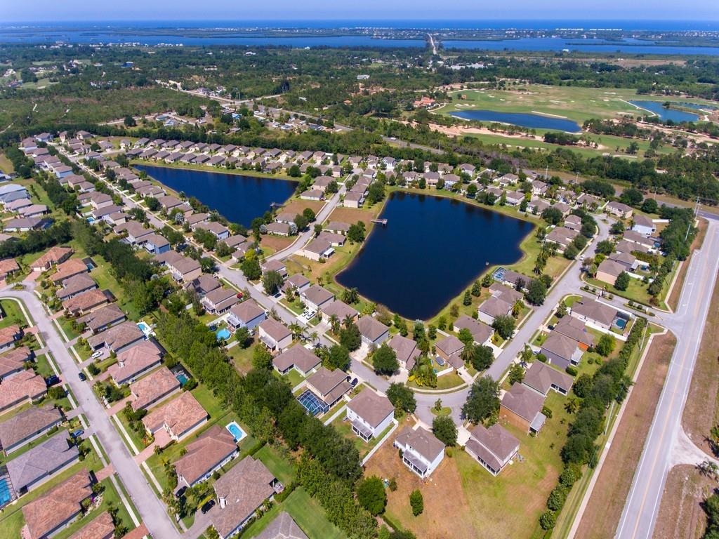 5985 Ridge Lake Circle Vero Beach, FL 32967 - Photo 25 of 27 an aerial view of lake and city