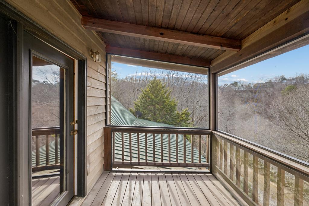 101 Moonshine Mountain Road Mineral Bluff, GA 30559 - Photo 39 of 70 a view of a balcony with wooden floor