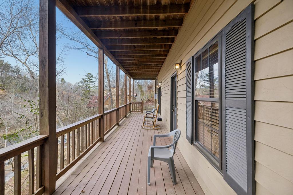 101 Moonshine Mountain Road Mineral Bluff, GA 30559 - Photo 42 of 70 a view of balcony with wooden floor
