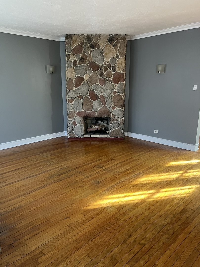 1243 West 96th Street Chicago, IL 60643 - Photo 2 of 13 a view of empty room with wooden floor