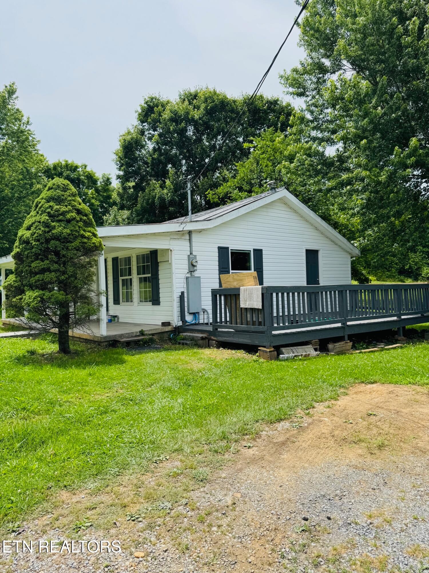 738 Warford Road Newport, TN 37821 - Photo 3 of 17 a view of a house with backyard and sitting area