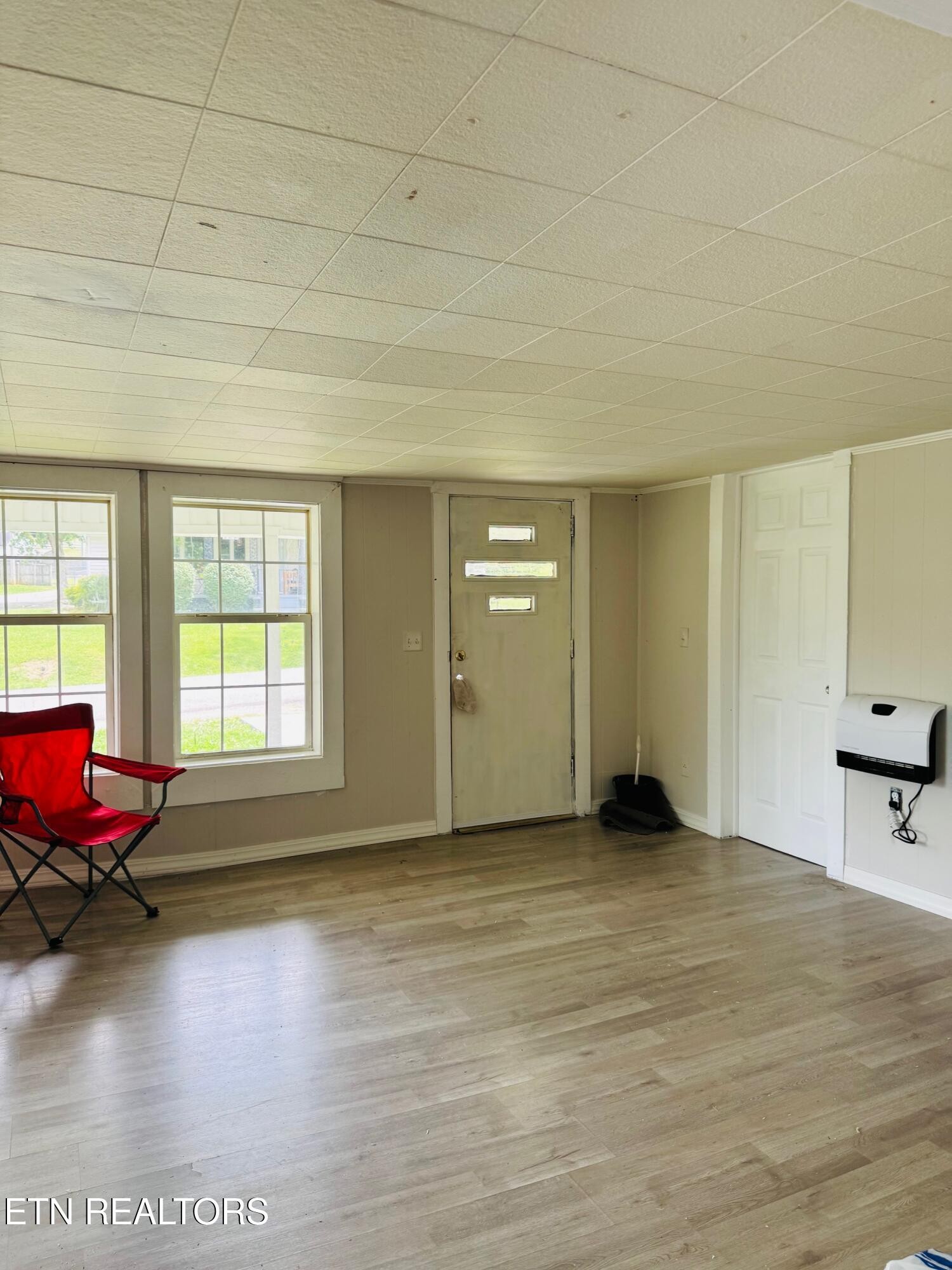 738 Warford Road Newport, TN 37821 - Photo 8 of 17 a view of empty room with wooden floor and fan