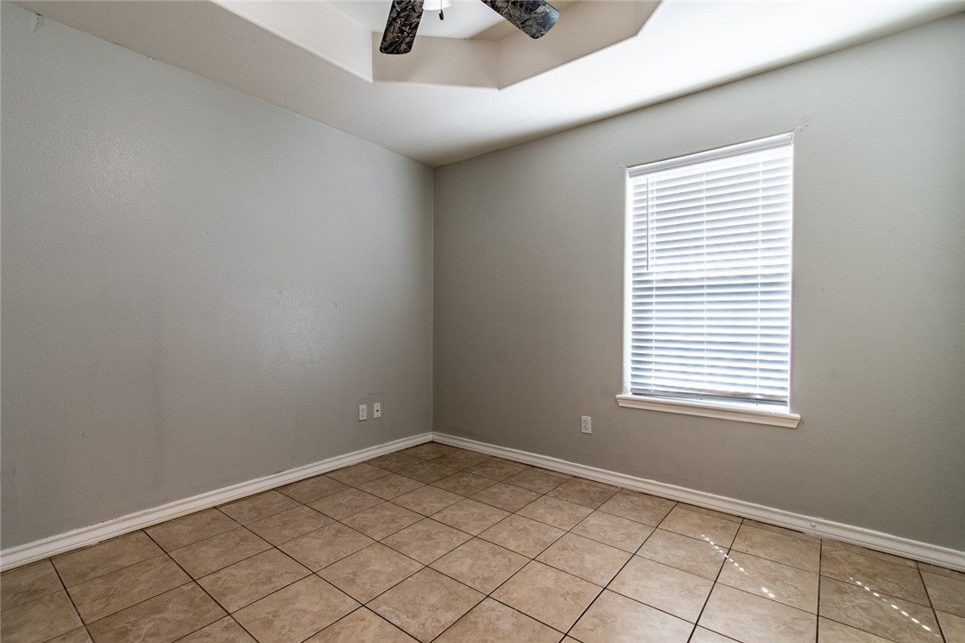 103 Collins Street Odem, TX 78370 - Photo 20 of 32 an empty room with windows