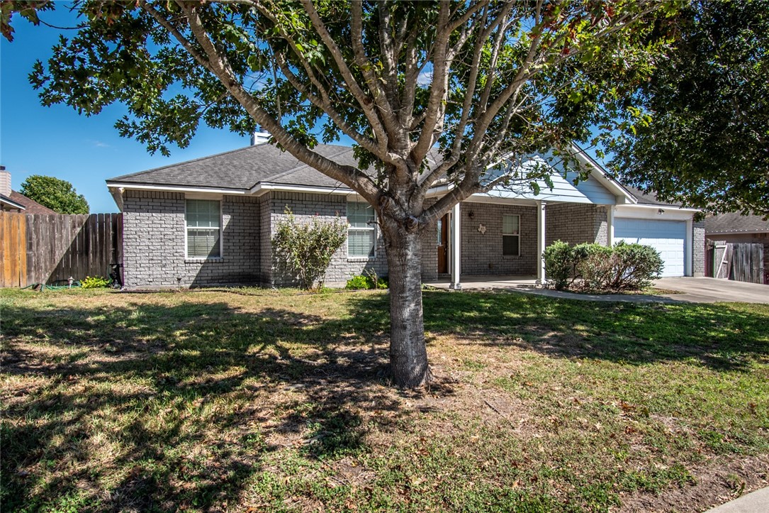 103 Collins Street Odem, TX 78370 - Photo 2 of 32 front view of a house with a yard